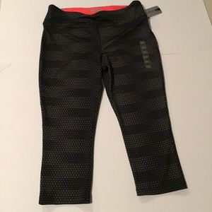 Forever 21 Capri leggings. Black/gray. Zipper pocket back. Medium New with tags